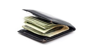 Black folded wallet or billfold with cash