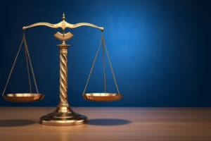 Law scales on blue background