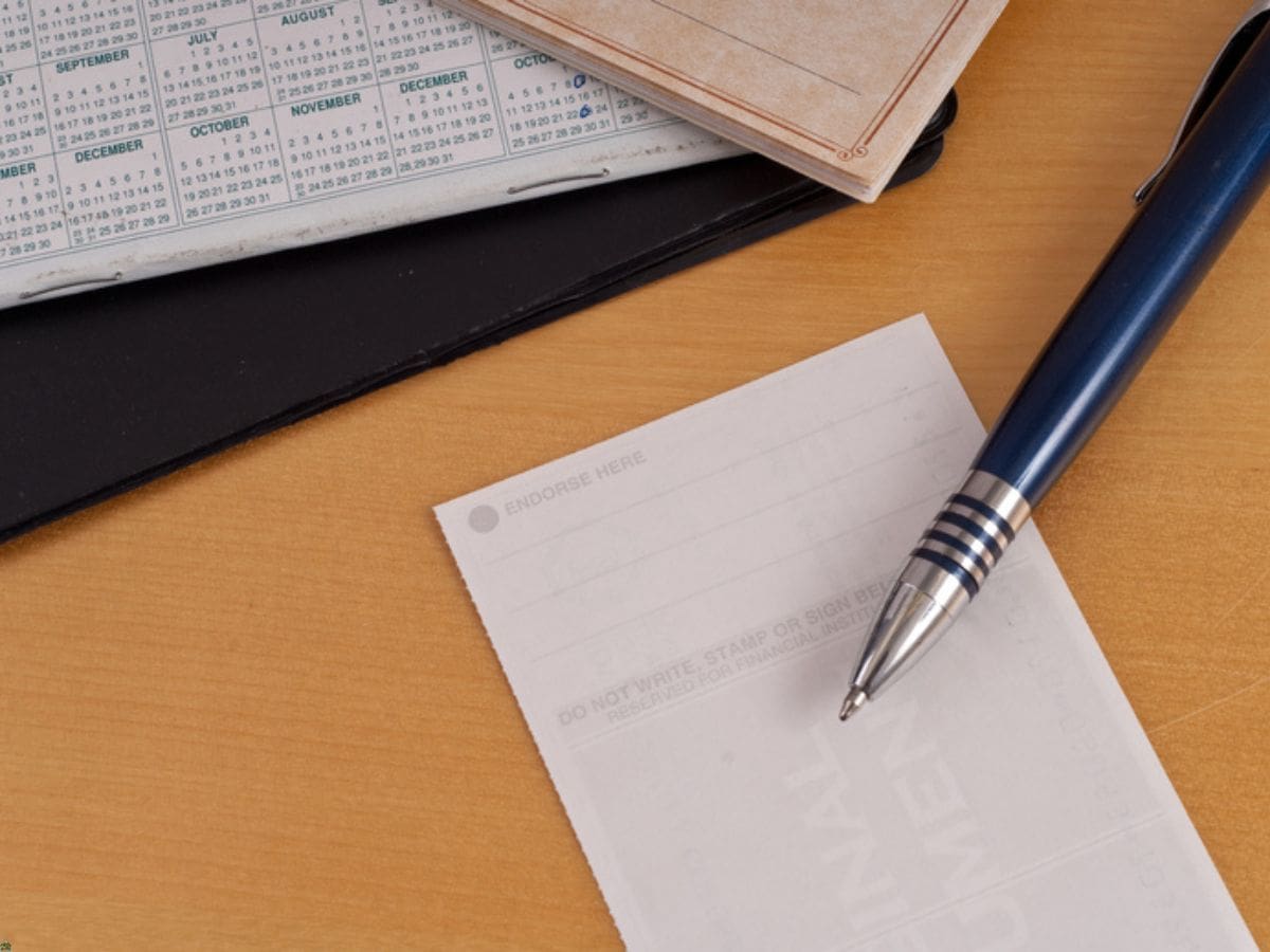 Check Endorsement With Pen And Calender